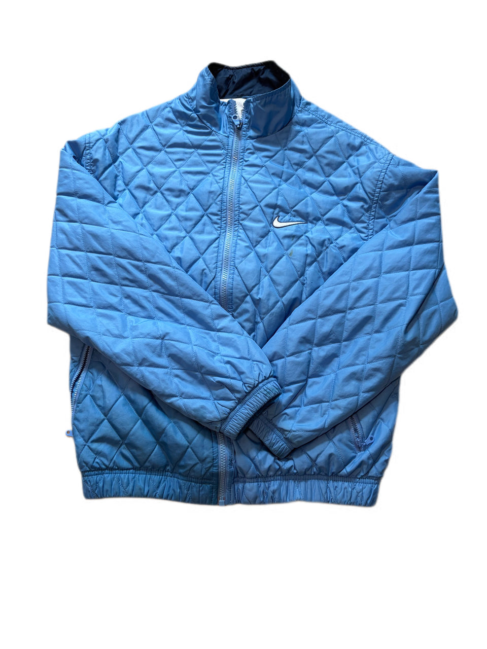 VINTAGE NIKE SWOOSH LIGHT BLUE QUILTED BOMBER JACKET